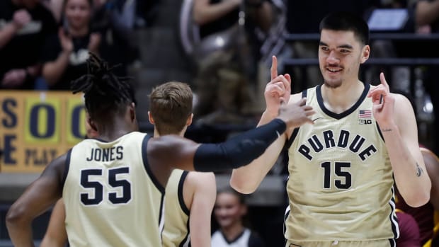 Purdue Boilermakers guard Lance Jones (55) and Purdue Boilermakers center Zach Edey (15) celebrate during the NCAA men s basketball game against the Minnesota Golden Gophers, Thursday, Feb. 15, 2024, at Mackey Arena in West Lafayette, Ind.